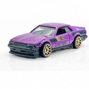 Машинка Hot Wheels Базовой коллекции Nissan Skyline RS [KDR30] (5785 HTC40) mainline 2024